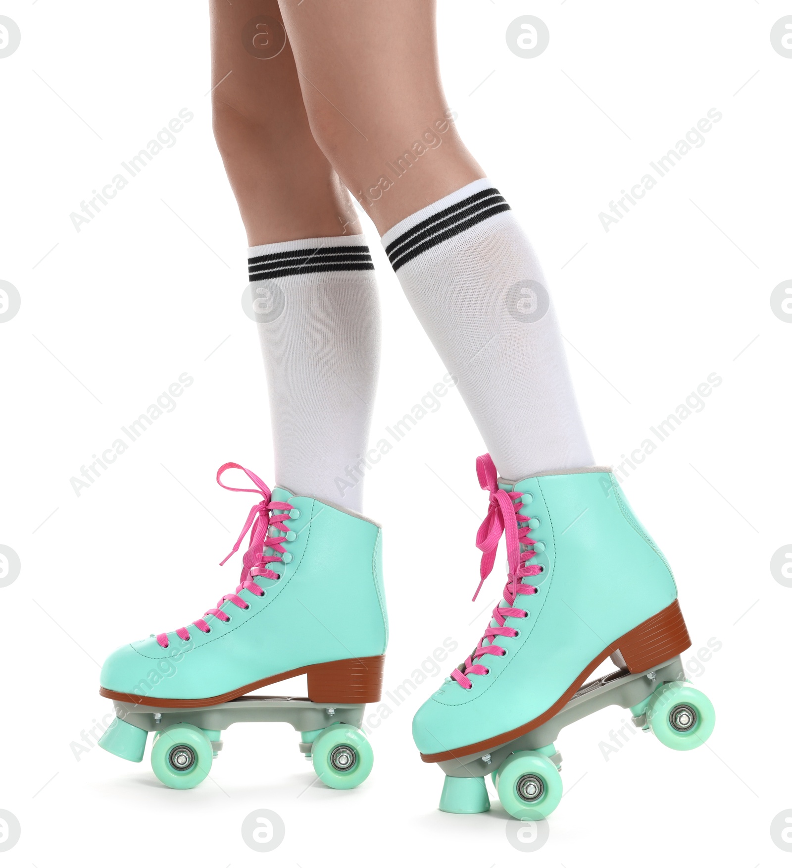 Woman in roller skates on white background, closeup Photo of Woman in roller skates on white background, closeup