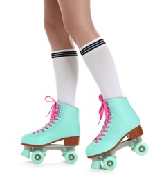 Photo of Woman in roller skates on white background, closeup