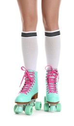 Photo of Woman in roller skates on white background, closeup