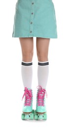 Photo of Woman in roller skates on white background, closeup