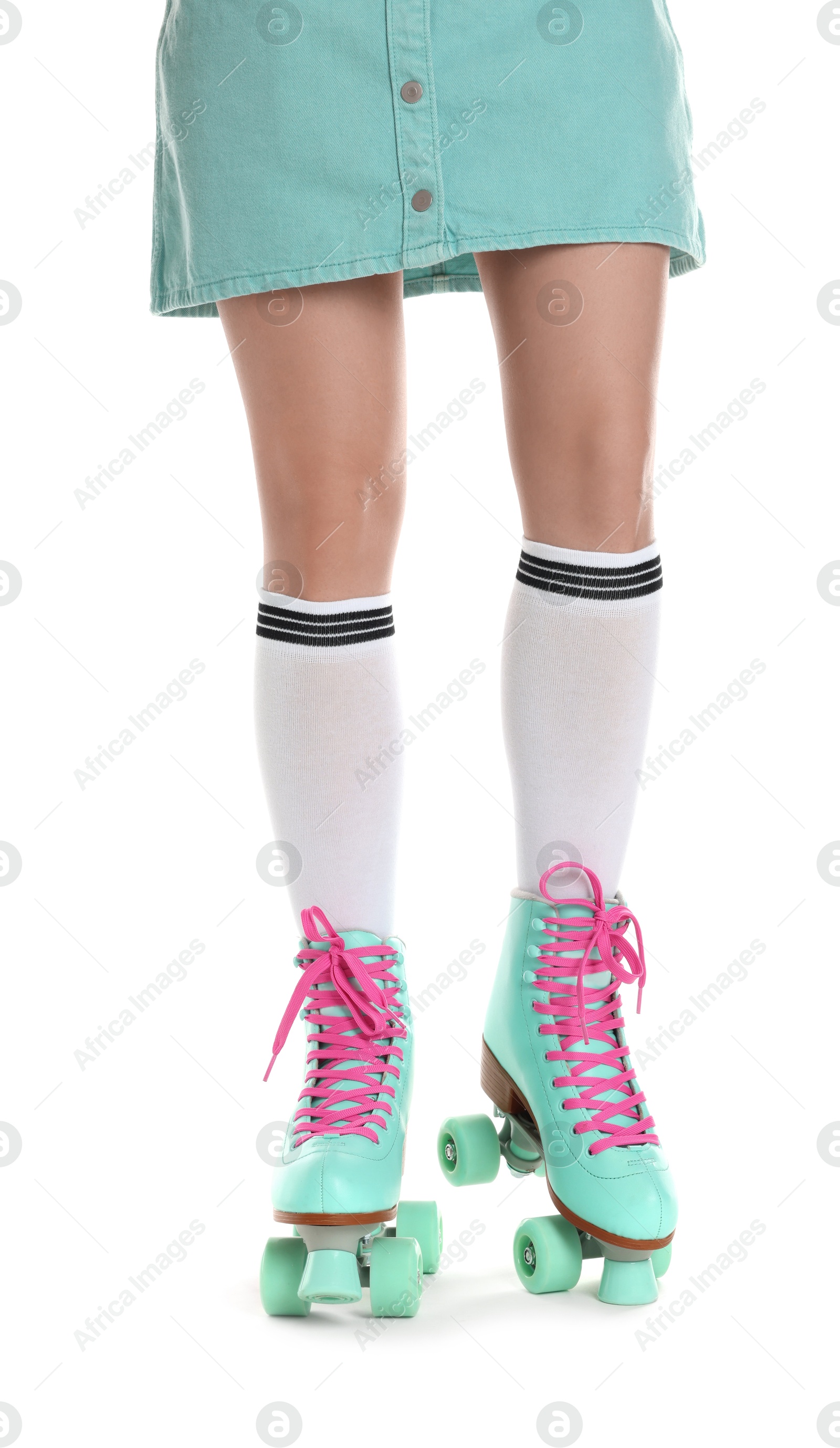 Woman in roller skates on white background, closeup Photo of Woman in roller skates on white background, closeup