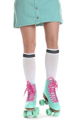 Photo of Woman in roller skates on white background, closeup