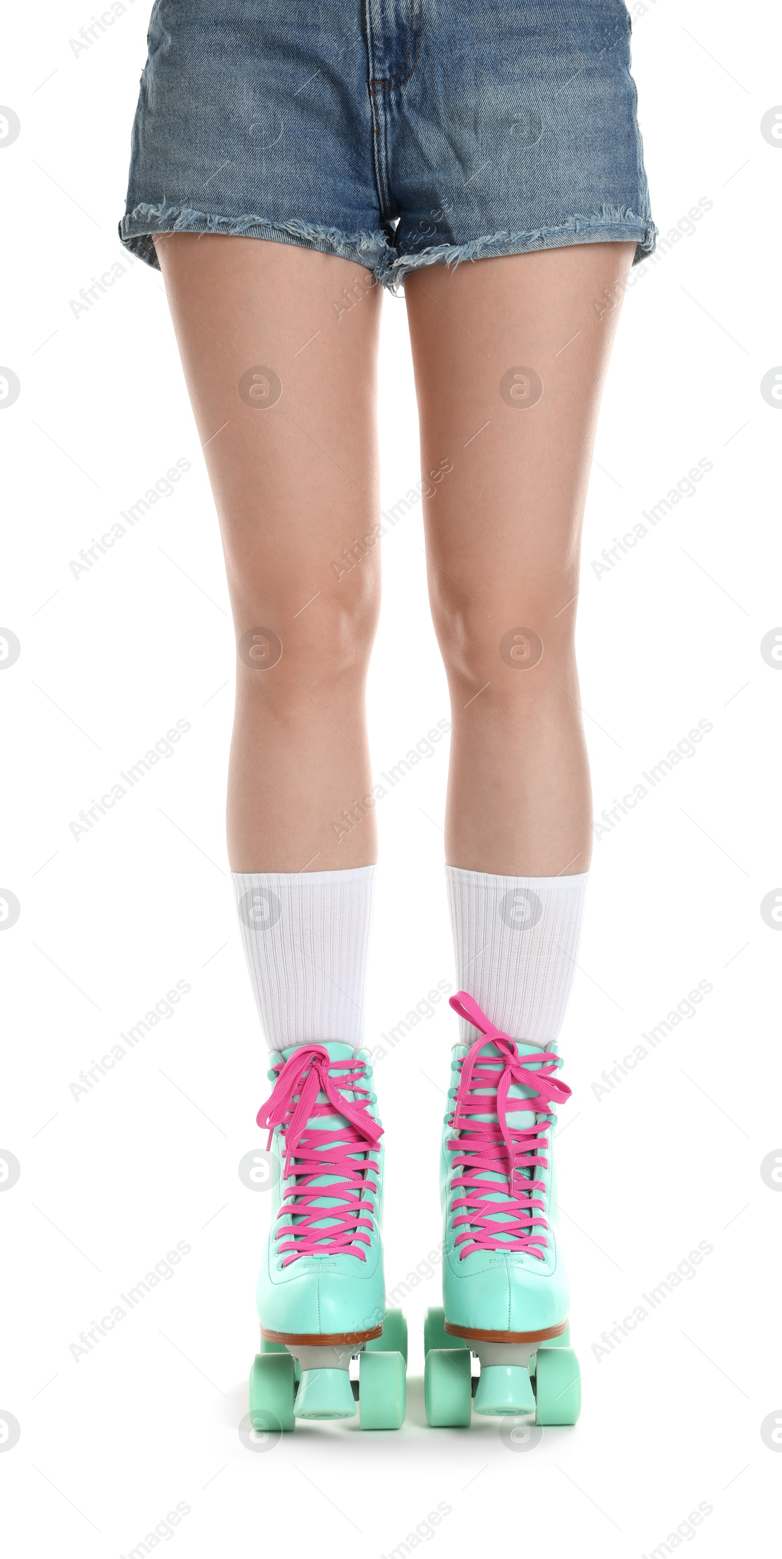Woman in roller skates on white background, closeup Photo of Woman in roller skates on white background, closeup