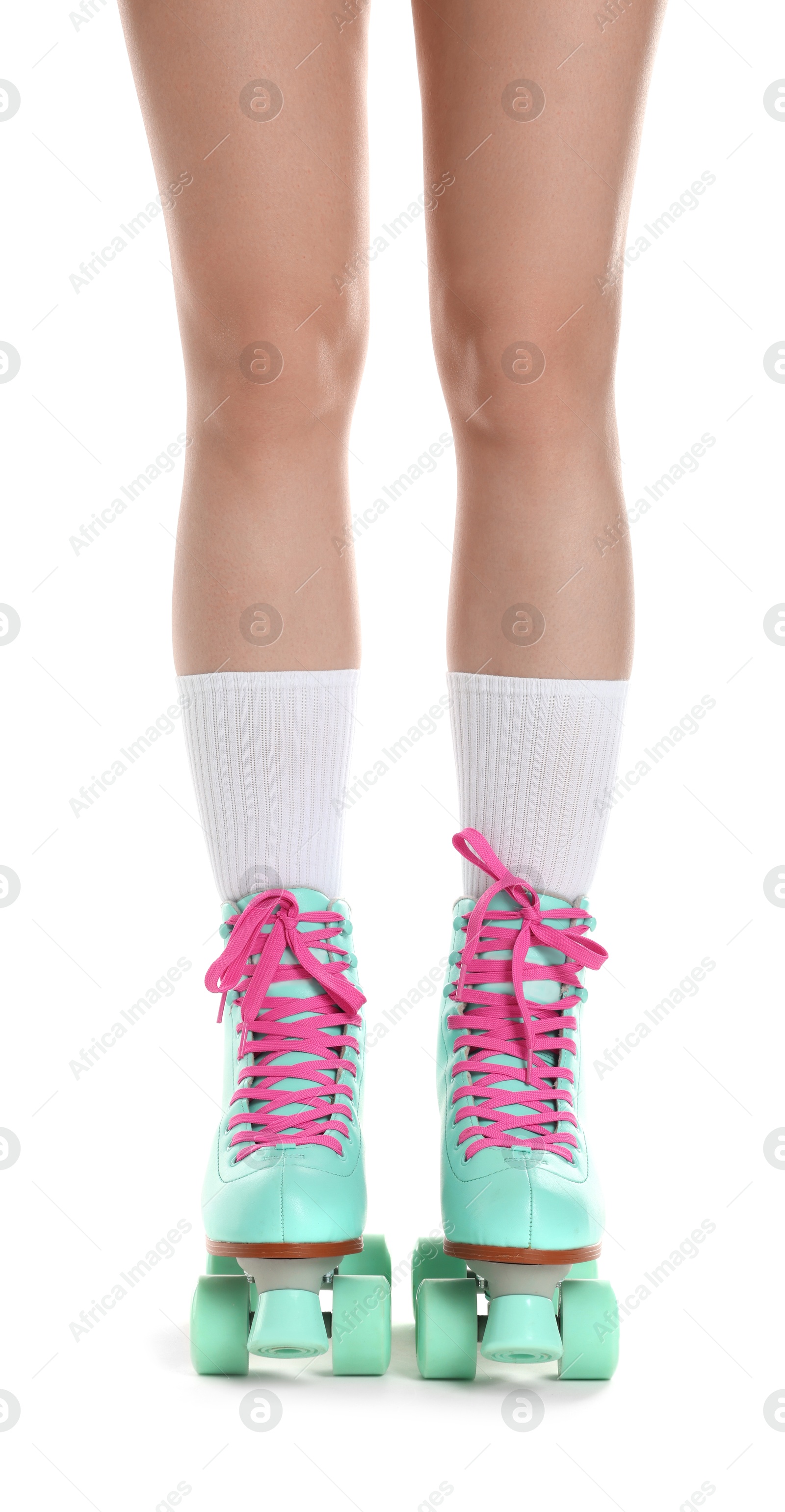Woman in roller skates on white background, closeup Photo of Woman in roller skates on white background, closeup