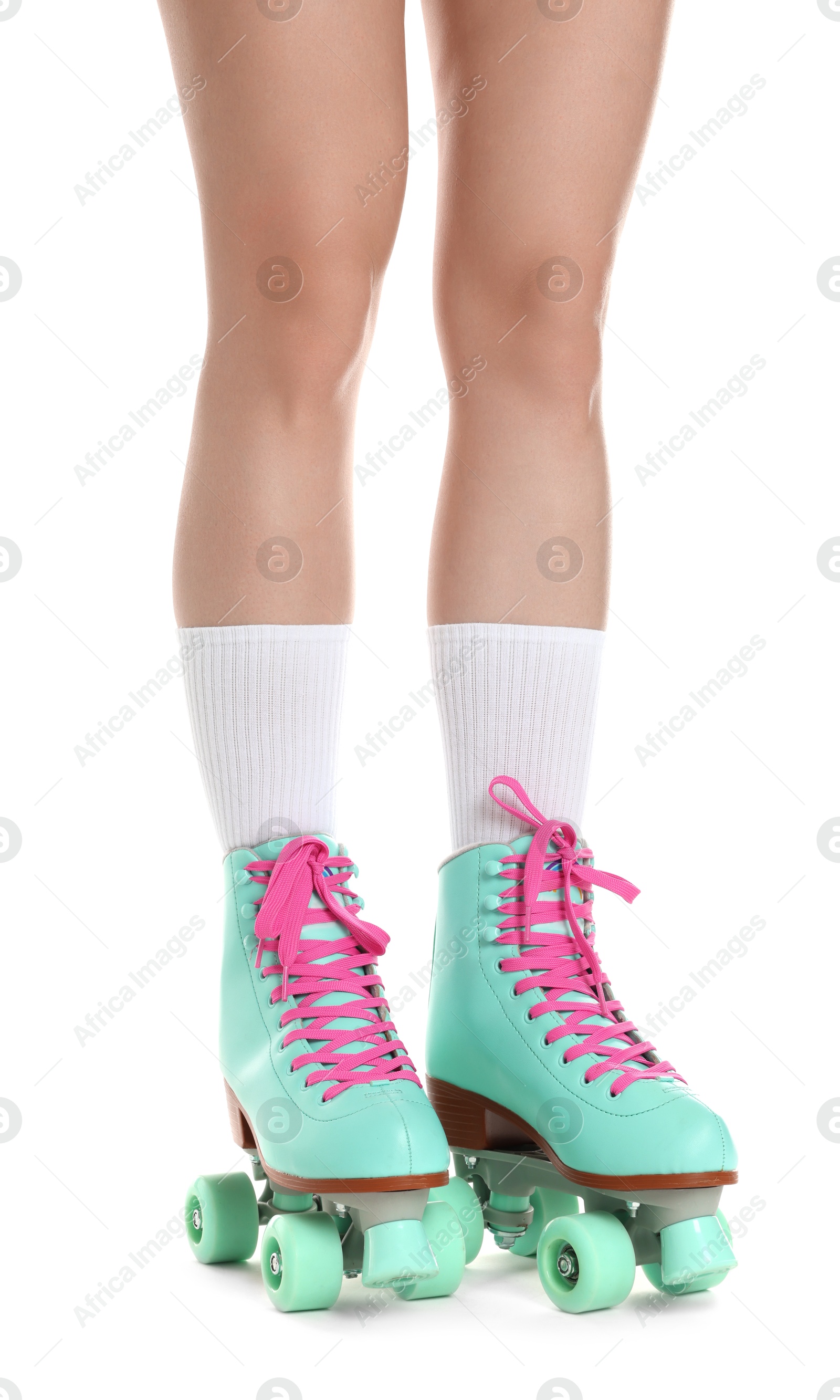 Woman in roller skates on white background, closeup Photo of Woman in roller skates on white background, closeup