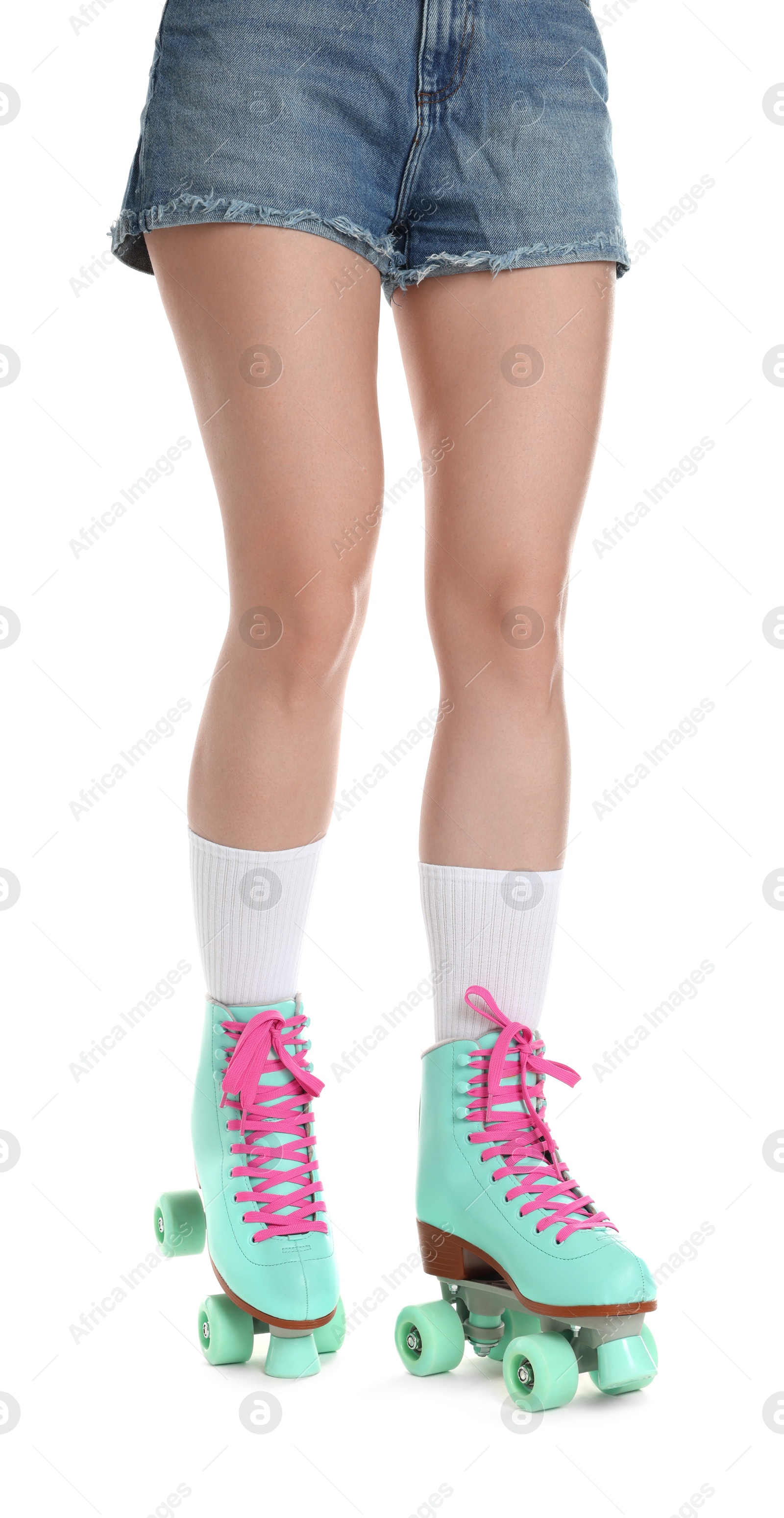 Woman in roller skates on white background, closeup Photo of Woman in roller skates on white background, closeup