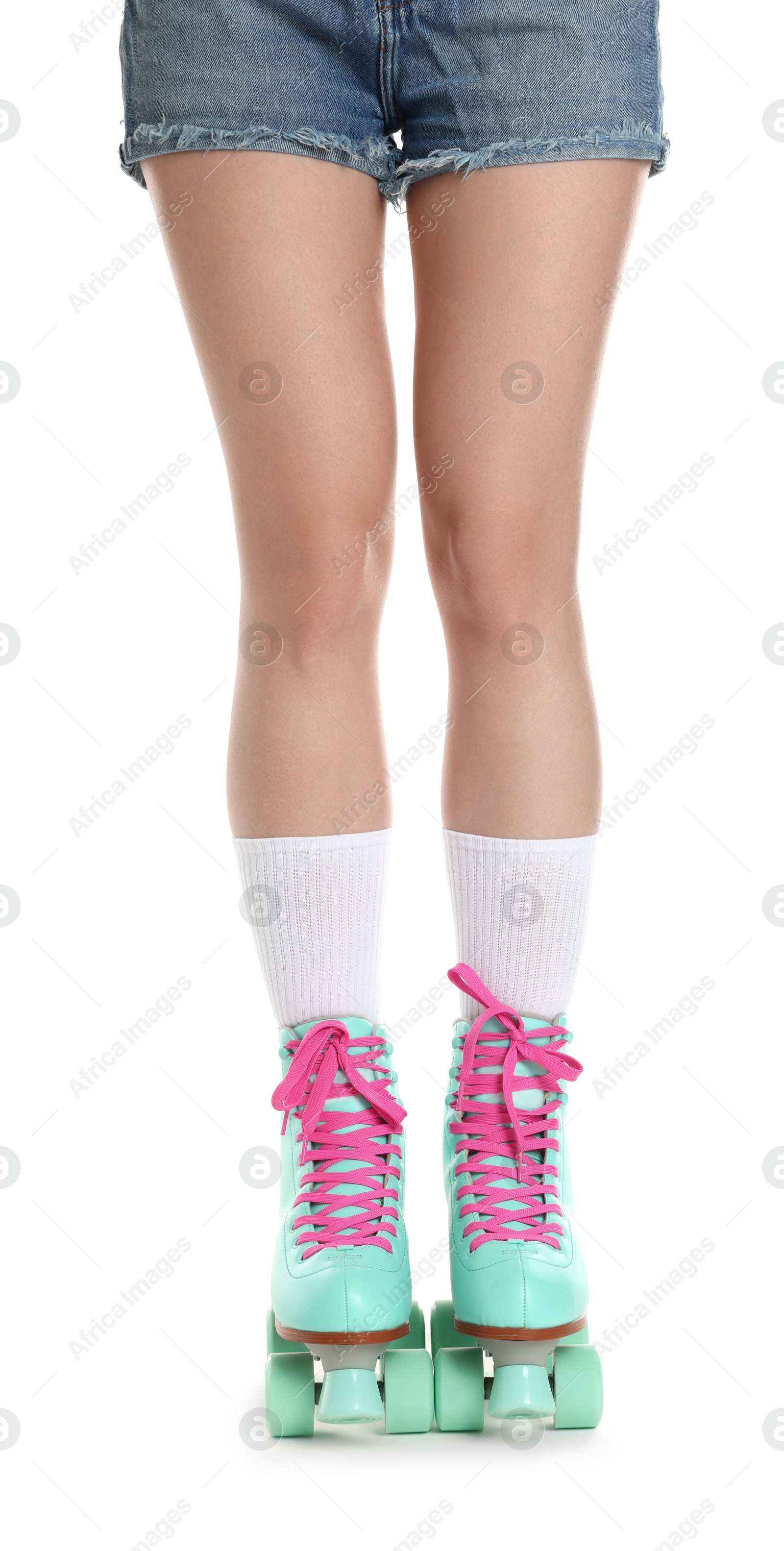 Woman in roller skates on white background, closeup Photo of Woman in roller skates on white background, closeup