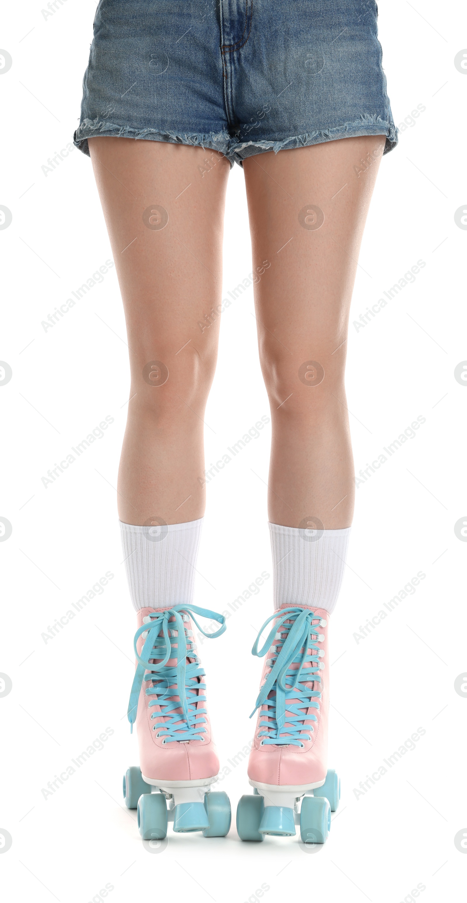 Woman in roller skates on white background, closeup Photo of Woman in roller skates on white background, closeup