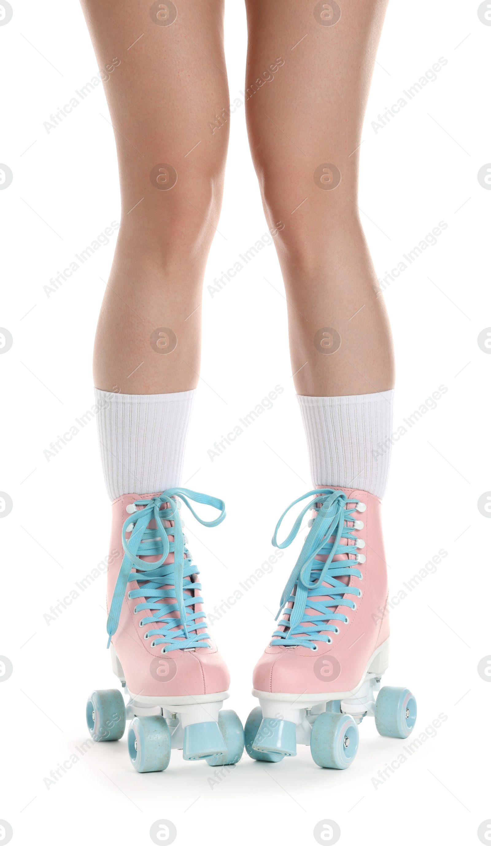 Woman in roller skates on white background, closeup Photo of Woman in roller skates on white background, closeup