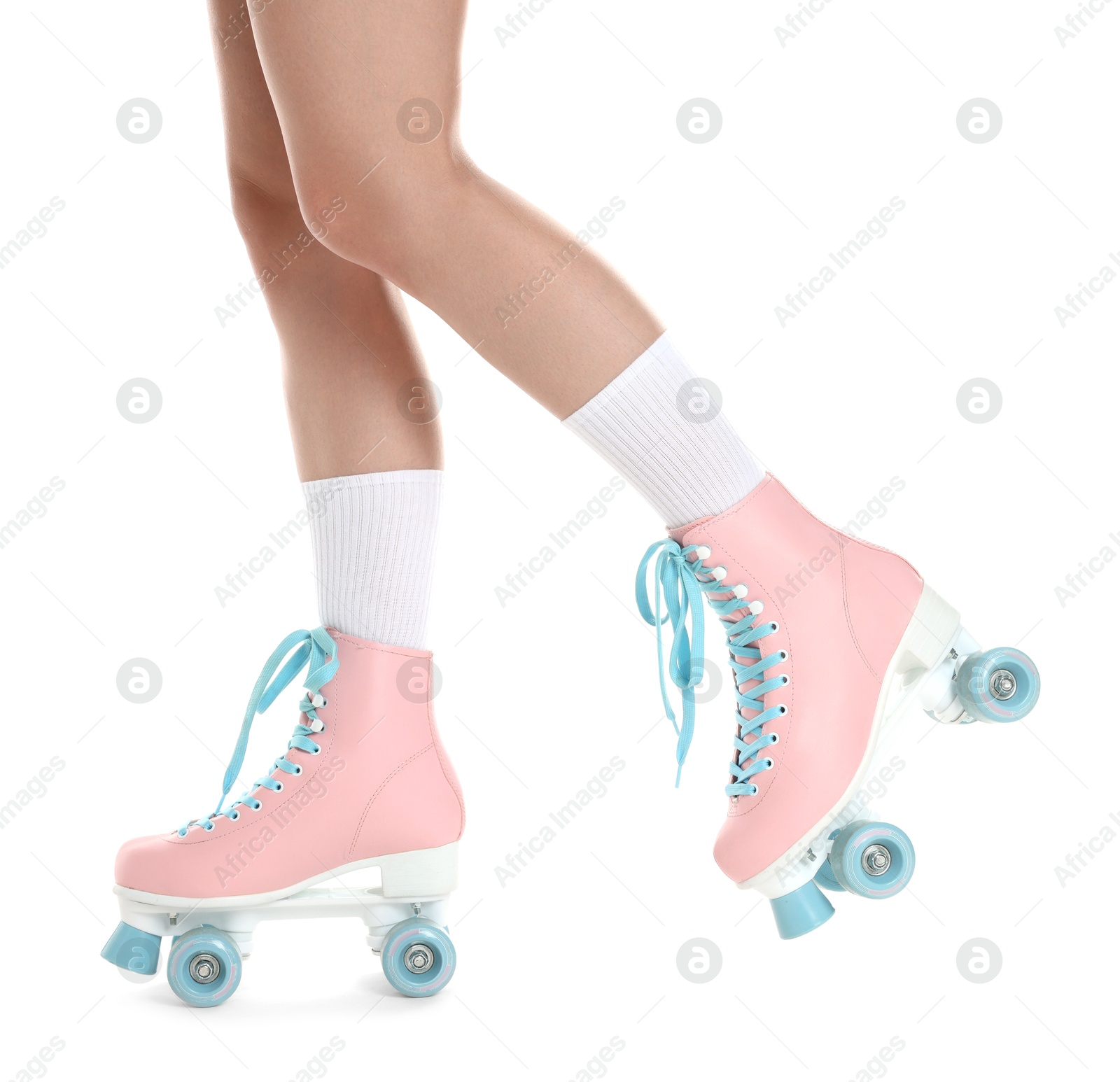 Woman in roller skates on white background, closeup Photo of Woman in roller skates on white background, closeup