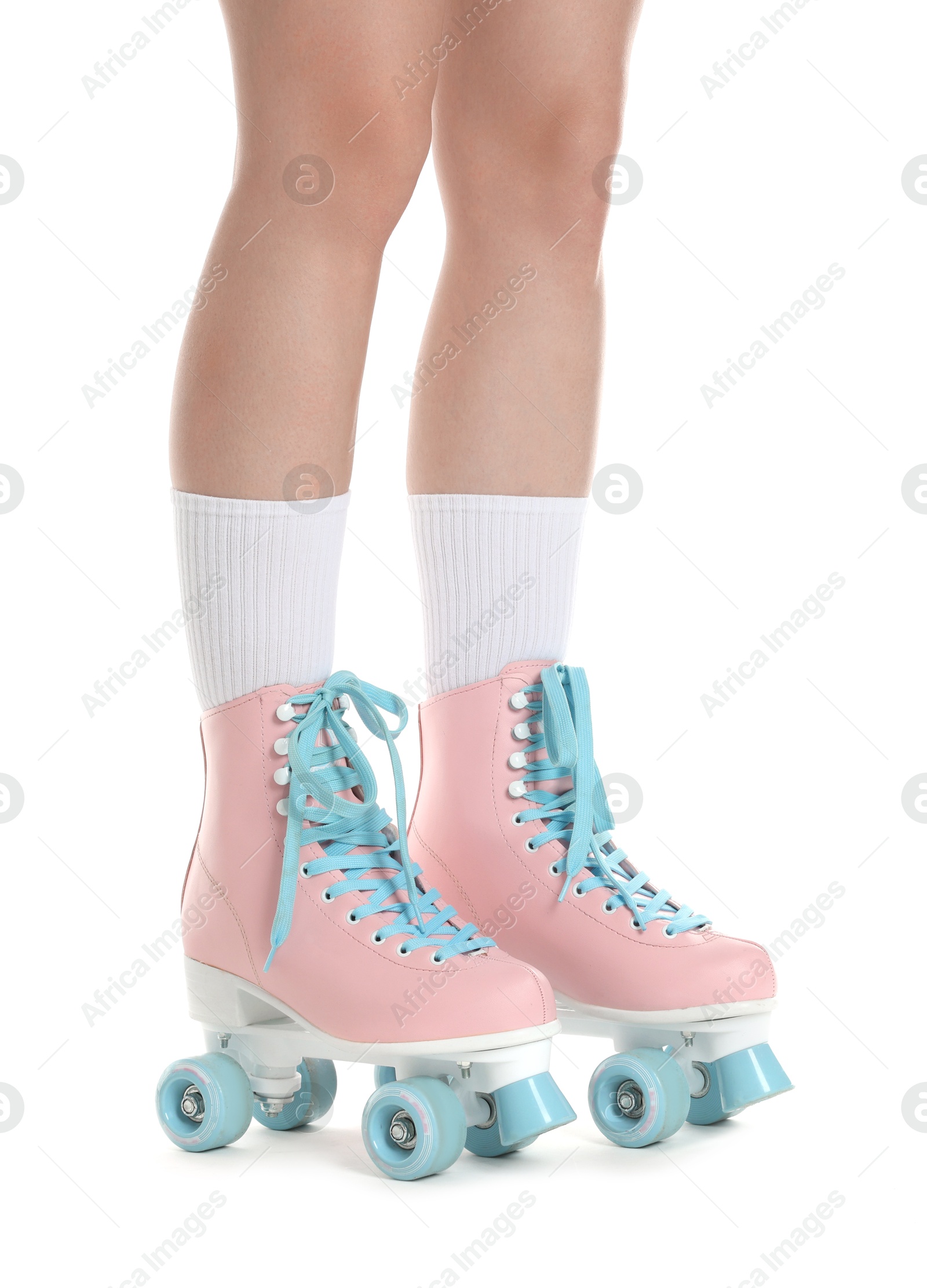 Woman in roller skates on white background, closeup Photo of Woman in roller skates on white background, closeup