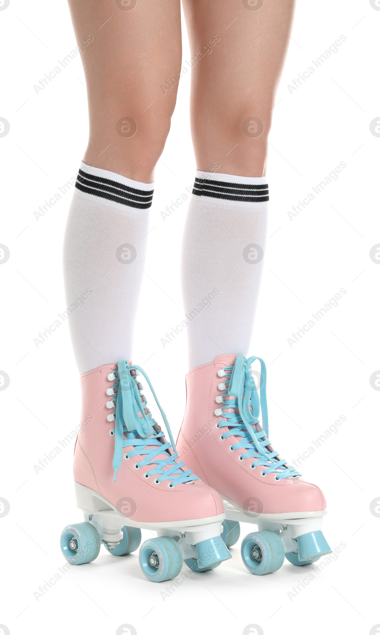 Woman in roller skates on white background, closeup Photo of Woman in roller skates on white background, closeup