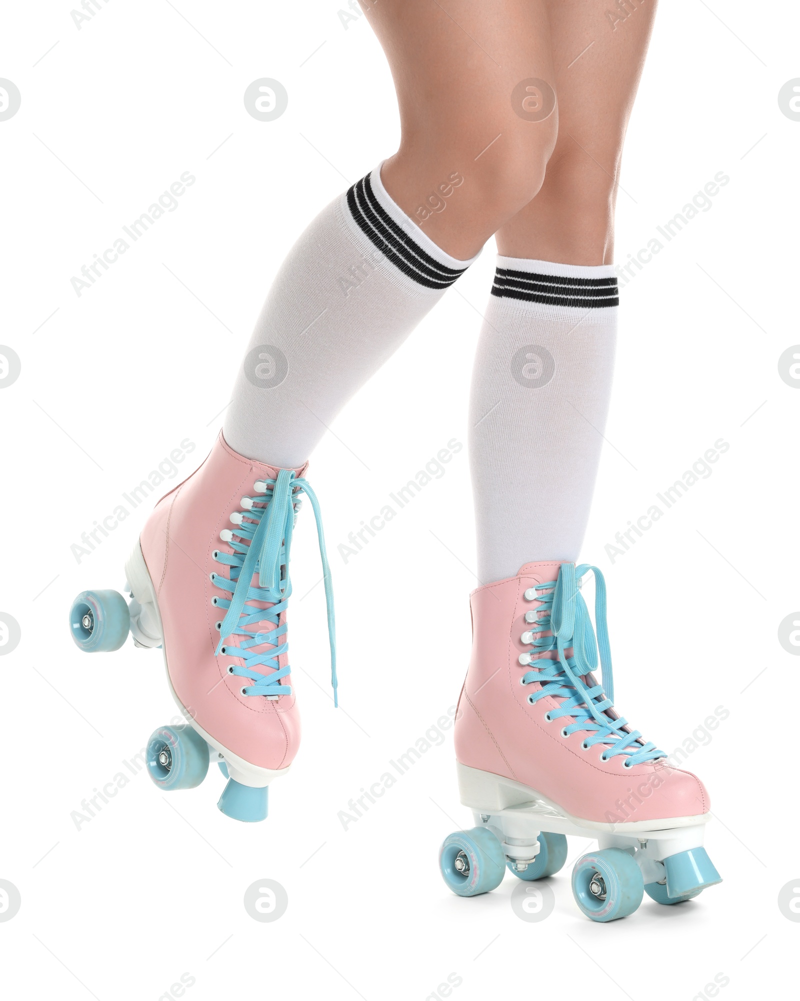 Woman in roller skates on white background, closeup Photo of Woman in roller skates on white background, closeup