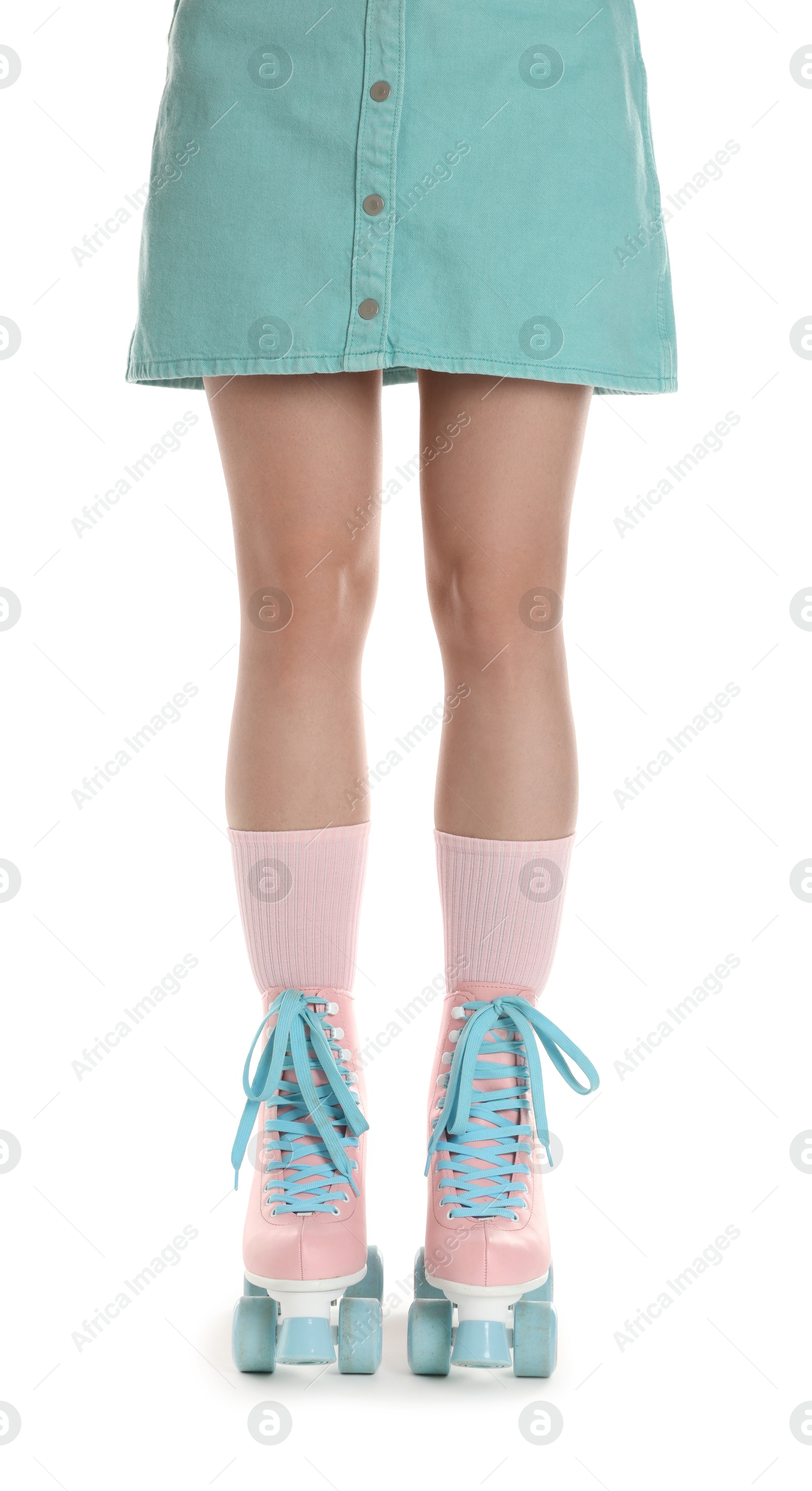 Woman in roller skates on white background, closeup Photo of Woman in roller skates on white background, closeup