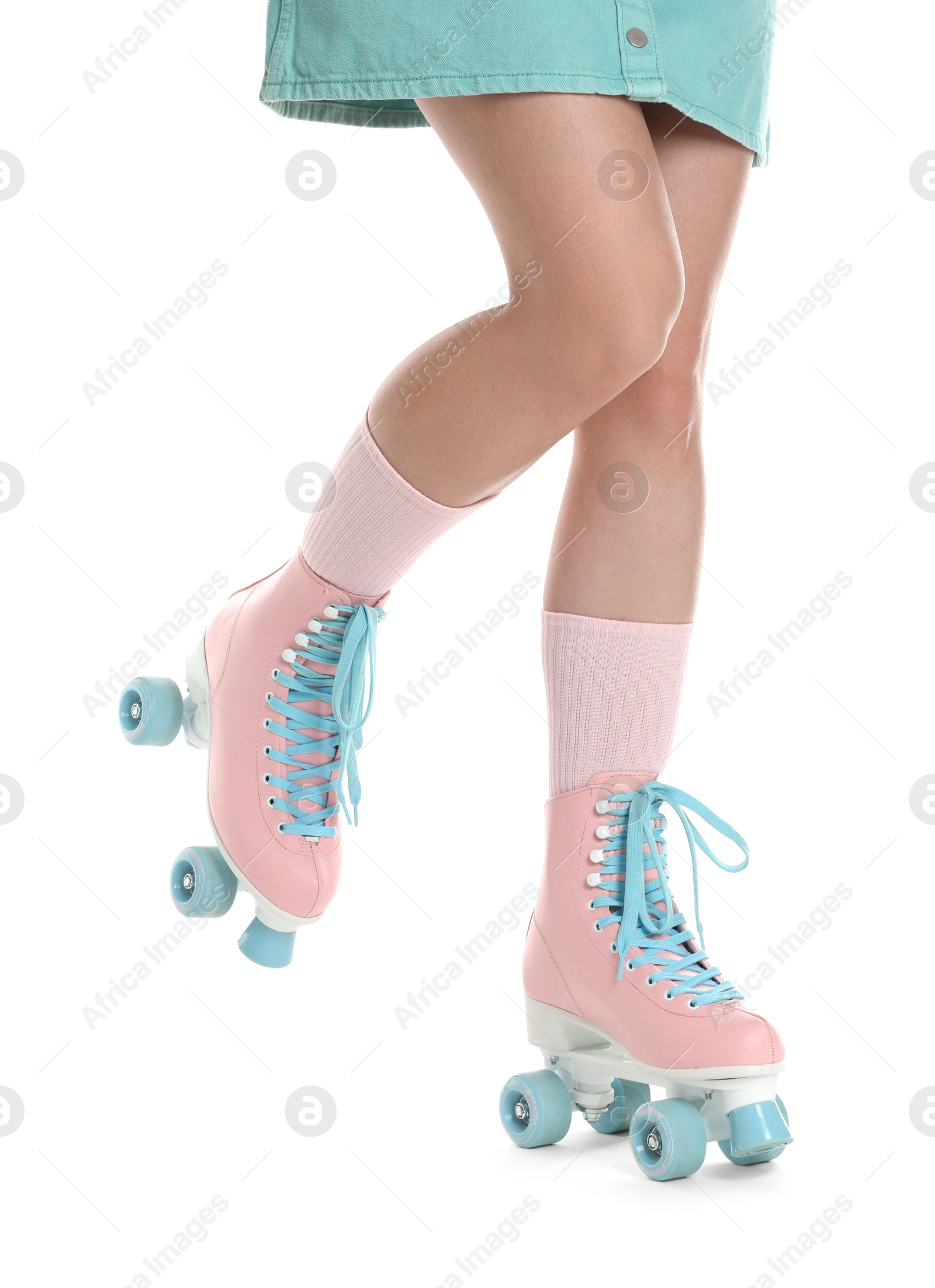 Woman in roller skates on white background, closeup Photo of Woman in roller skates on white background, closeup