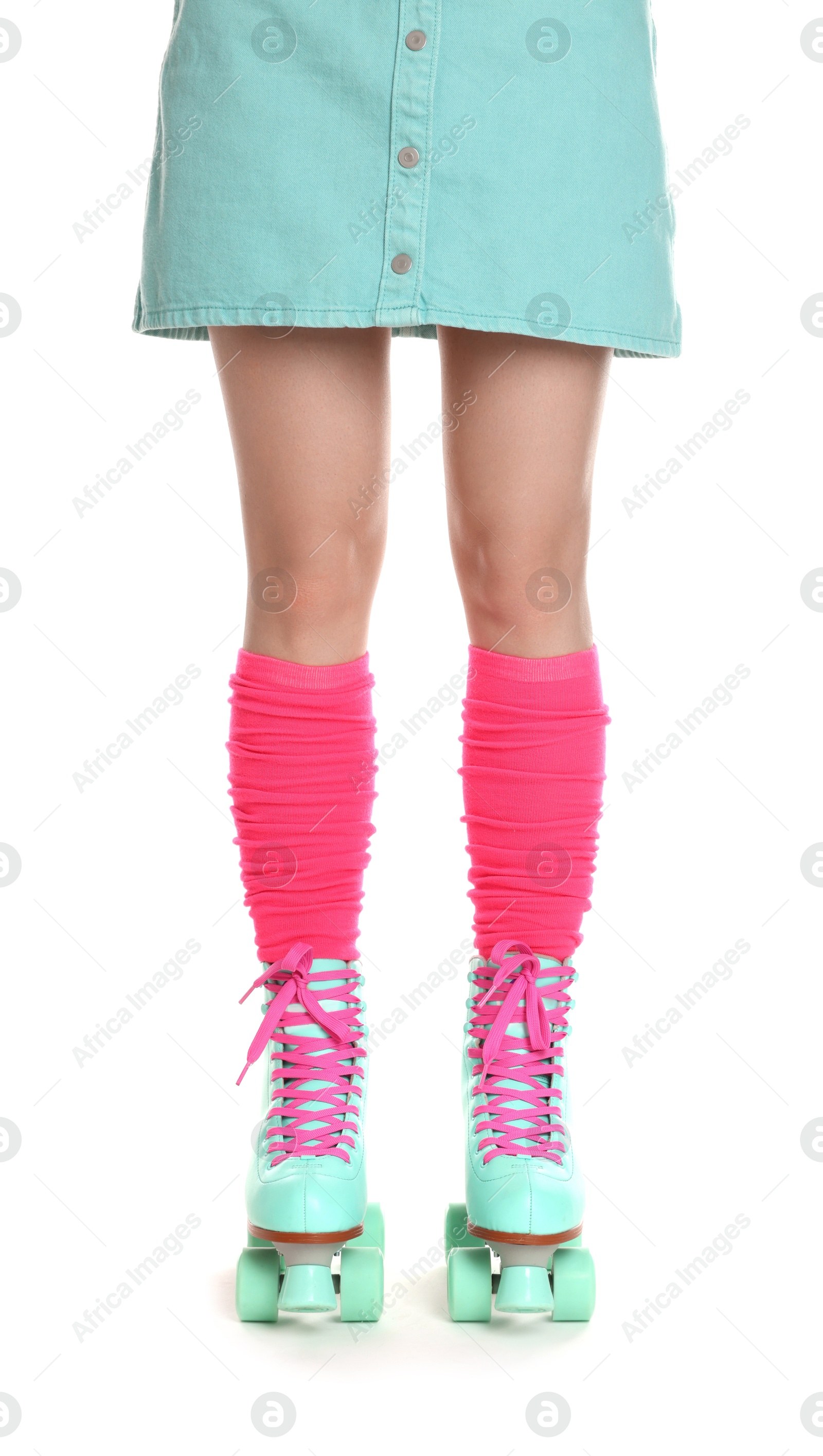Woman in roller skates on white background, closeup Photo of Woman in roller skates on white background, closeup