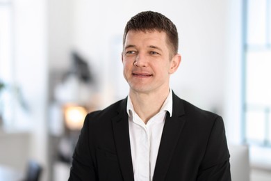 Photo of Portrait of handsome middle aged man indoors