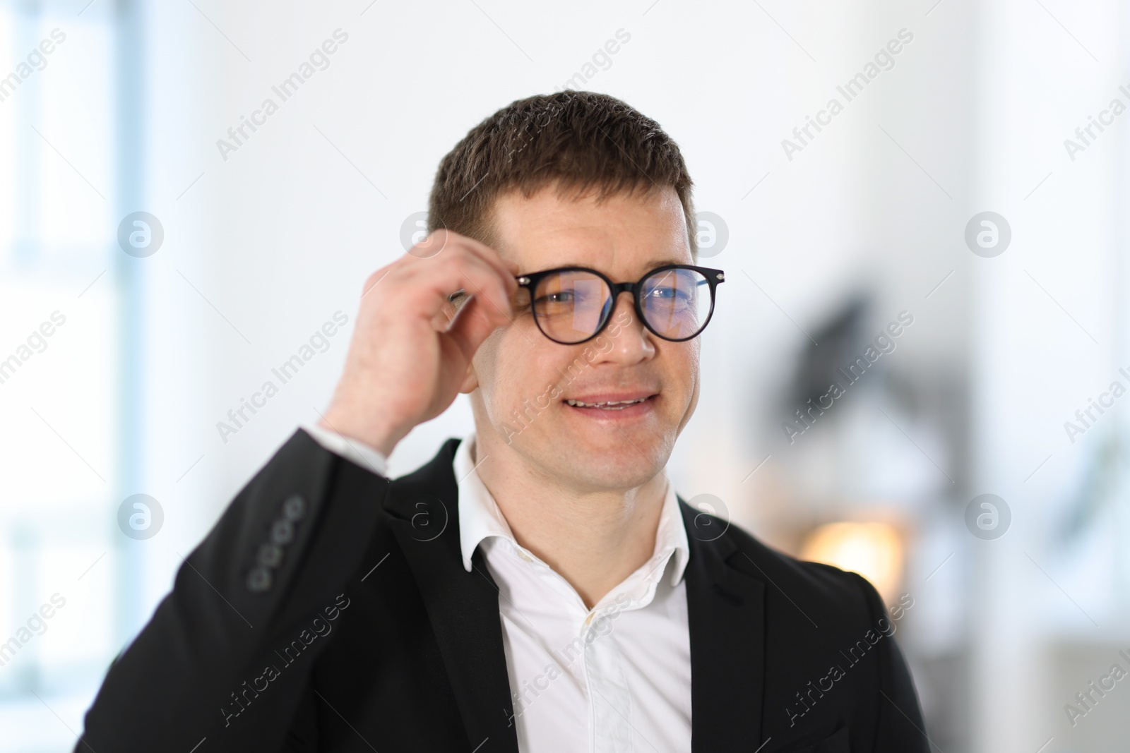 Portrait of handsome middle aged man indoors Photo of Portrait of handsome middle aged man indoors