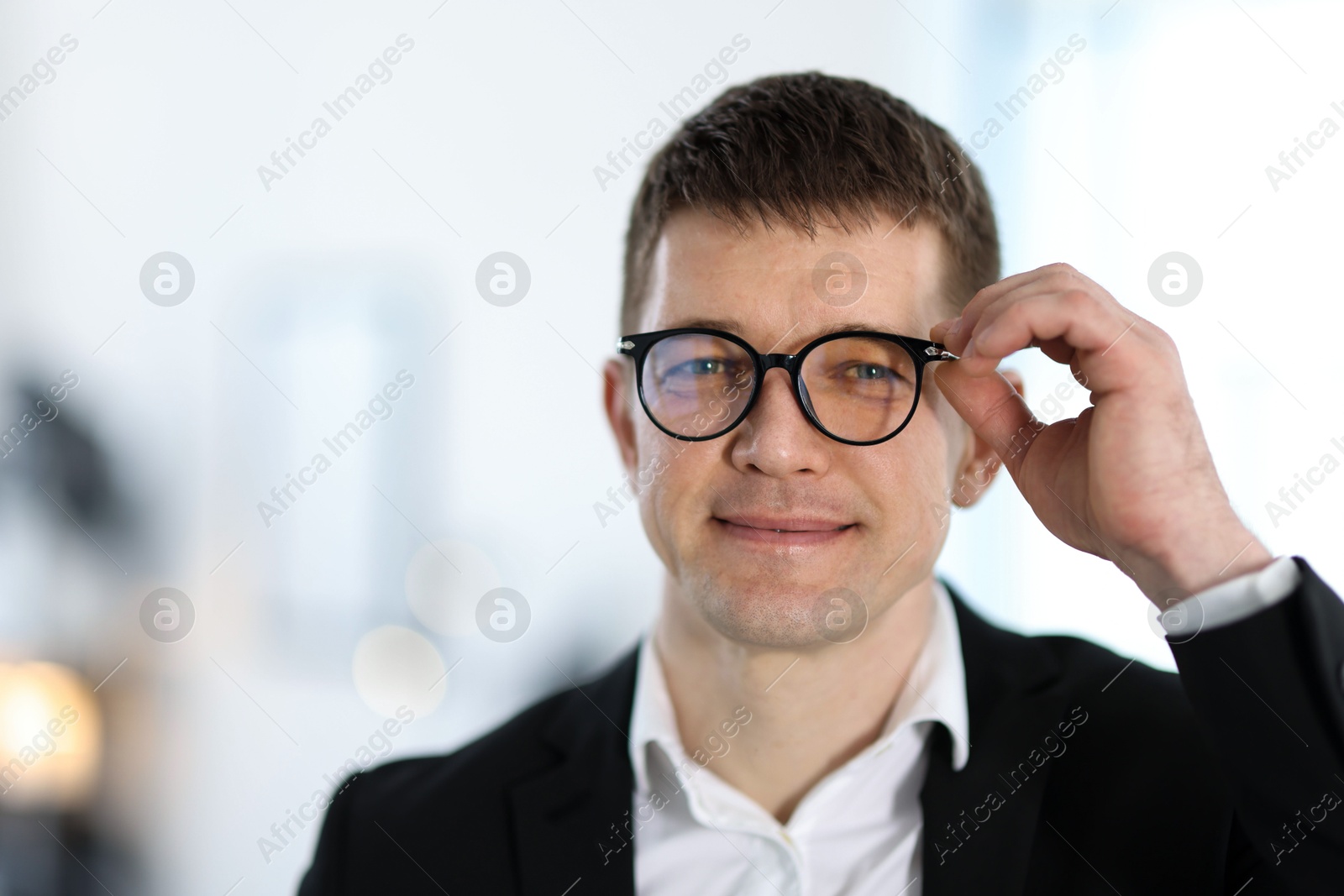Portrait of handsome middle aged man indoors Photo of Portrait of handsome middle aged man indoors