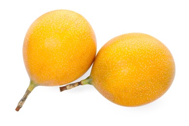 Photo of Whole ripe yellow passion fruits isolated on white, top view