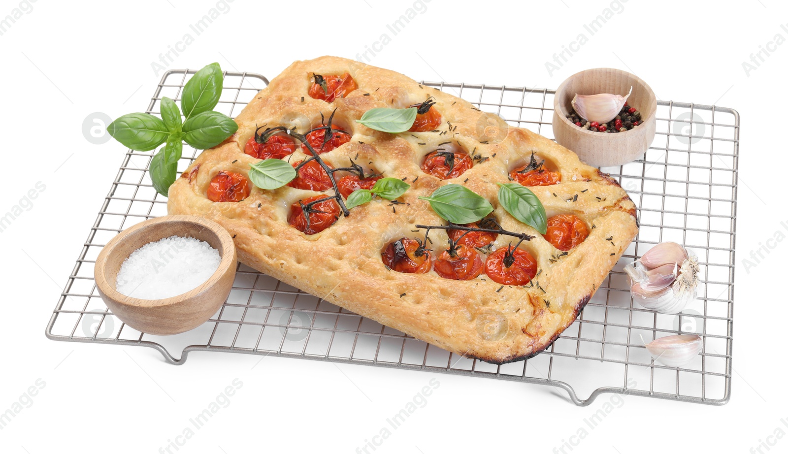 Delicious focaccia with tomatoes and spices isolated on white Photo of Delicious focaccia with tomatoes and spices isolated on white