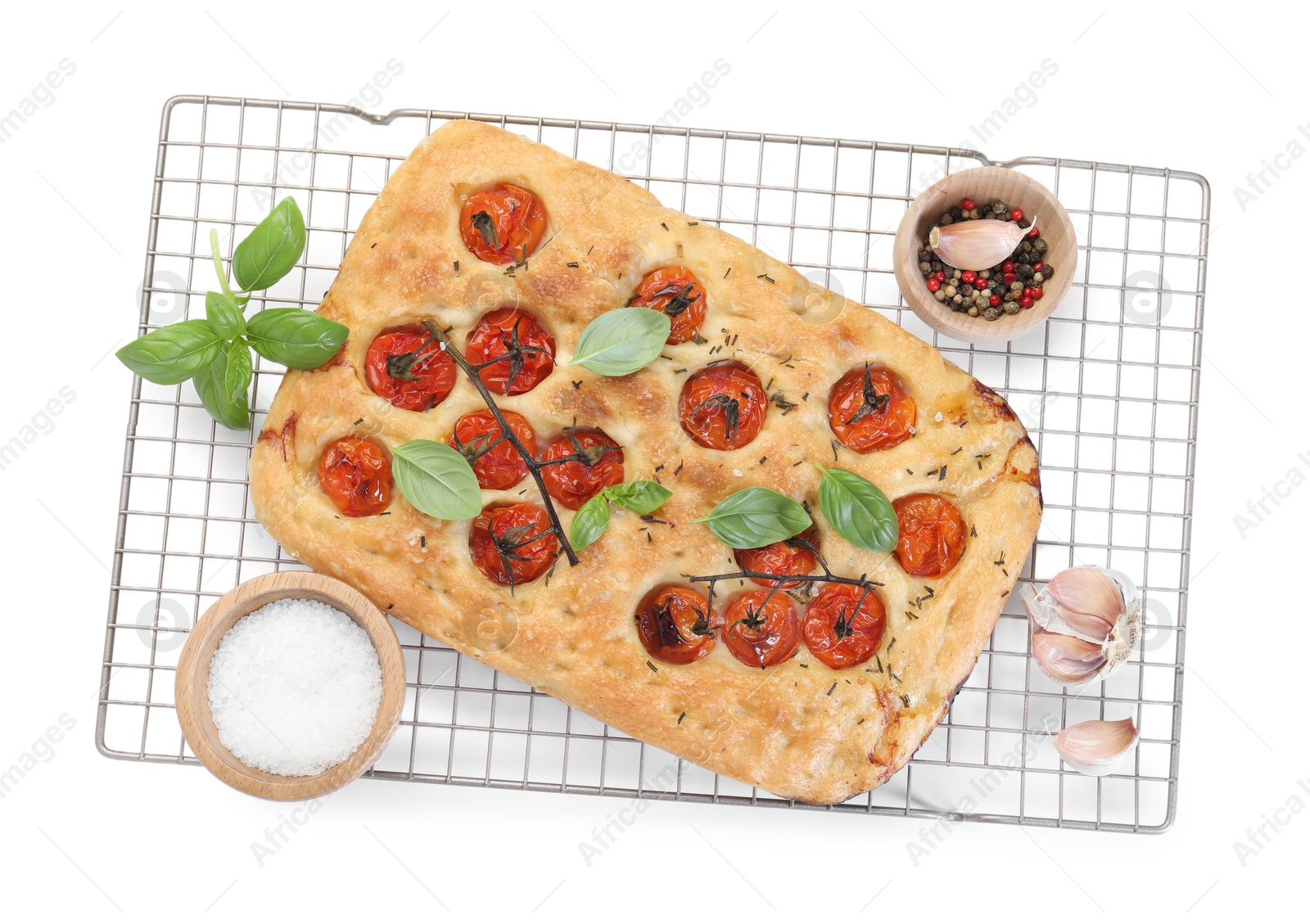 Delicious focaccia with tomatoes and spices isolated on white, top view Photo of Delicious focaccia with tomatoes and spices isolated on white, top view