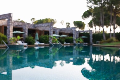 Photo of Outdoor swimming pool at resort, blurred view