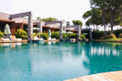 Photo of Outdoor swimming pool at resort, blurred view