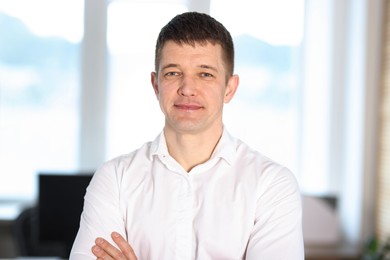 Photo of Portrait of handsome middle aged man indoors