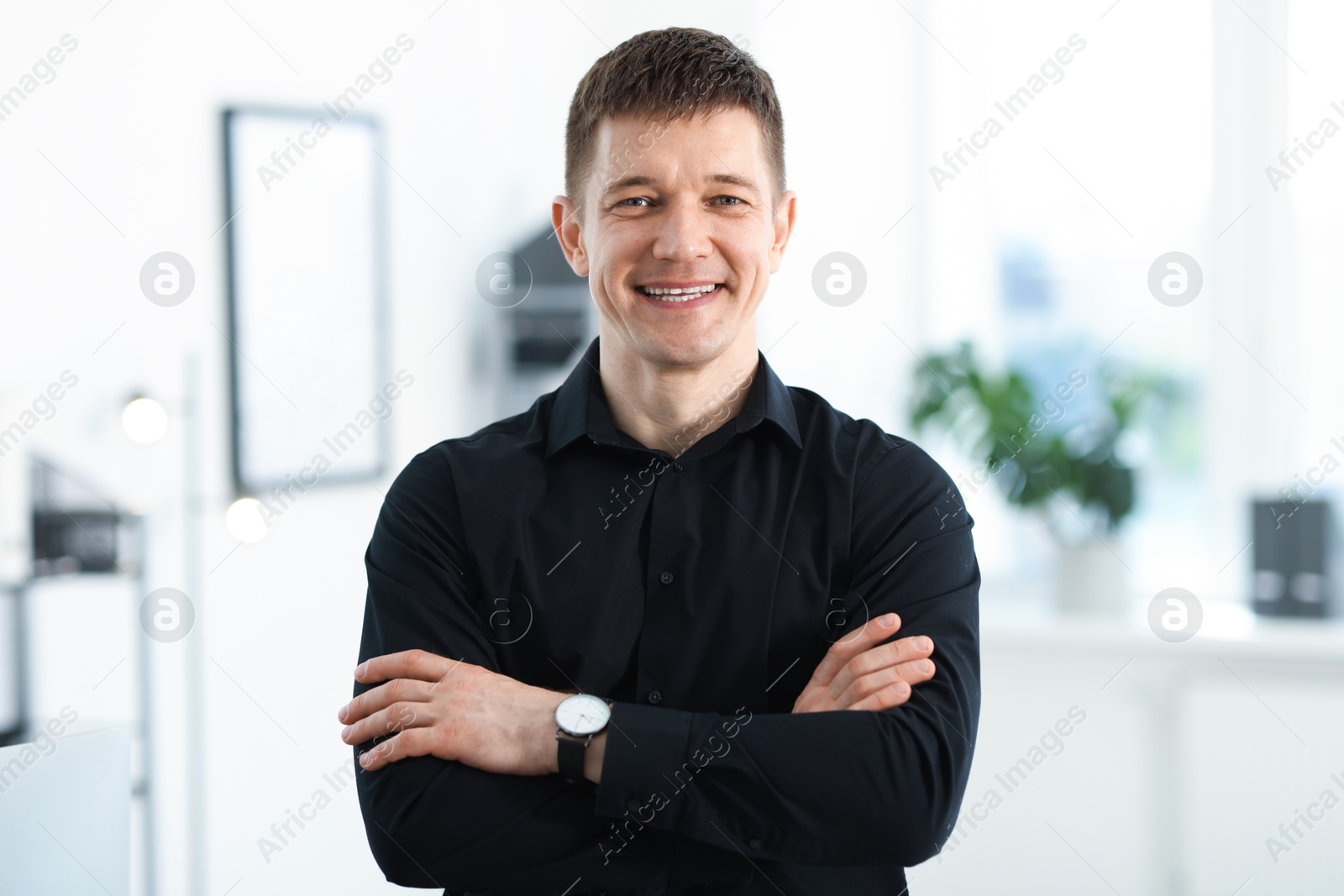 Portrait of handsome middle aged man indoors Photo of Portrait of handsome middle aged man indoors