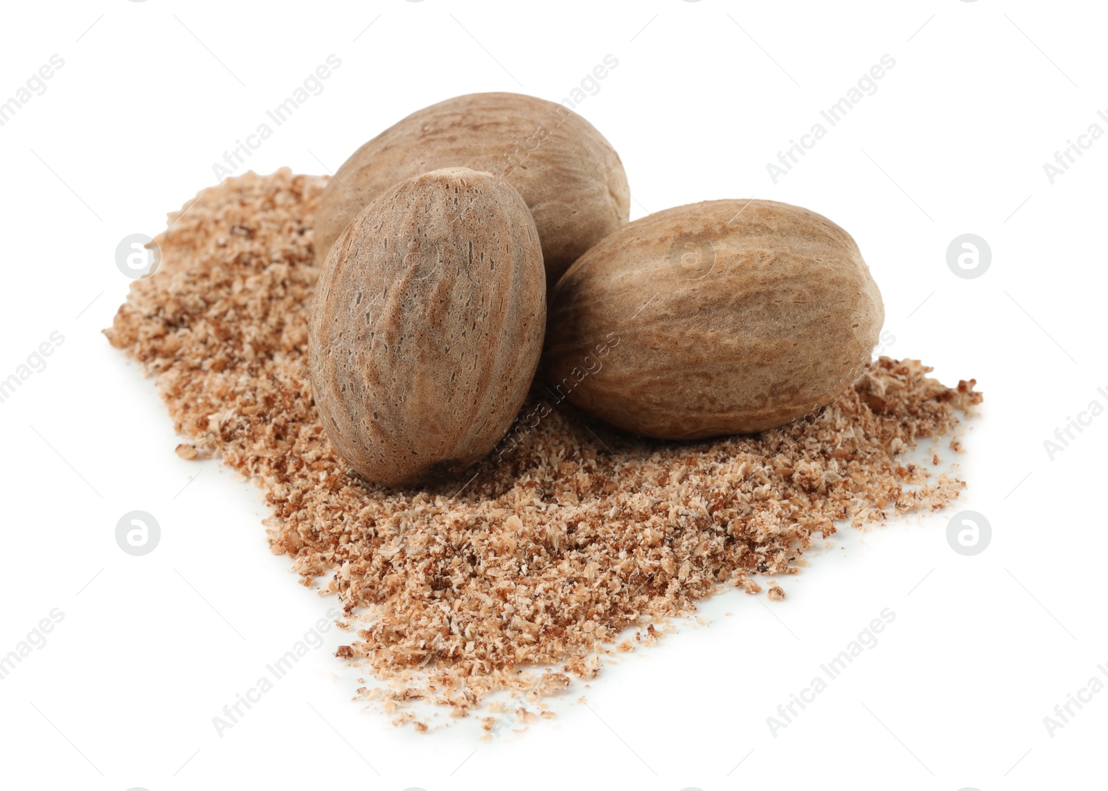 Whole nutmegs and powder isolated on white Photo of Whole nutmegs and powder isolated on white