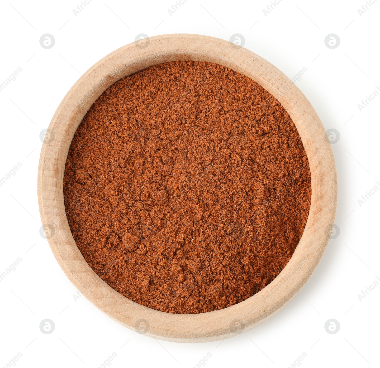 Nutmeg powder in bowl isolated on white, top view Photo of Nutmeg powder in bowl isolated on white, top view