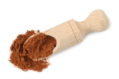 Photo of Nutmeg powder in scoop isolated on white, top view