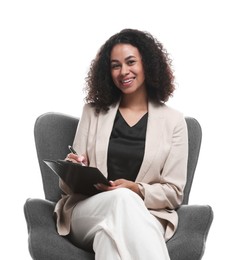 Photo of Professional psychologist with clipboard and pen in armchair on white background