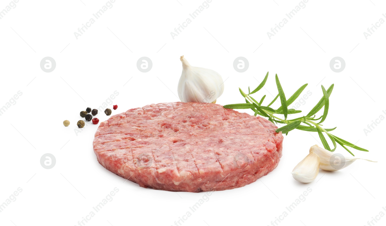 Fresh raw patty for burger and spices isolated on white Photo of Fresh raw patty for burger and spices isolated on white