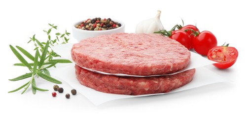 Photo of Fresh raw patties for burger, tomatoes and spices isolated on white