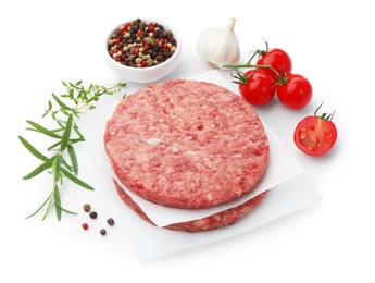 Photo of Fresh raw patties for burger, tomatoes and spices isolated on white