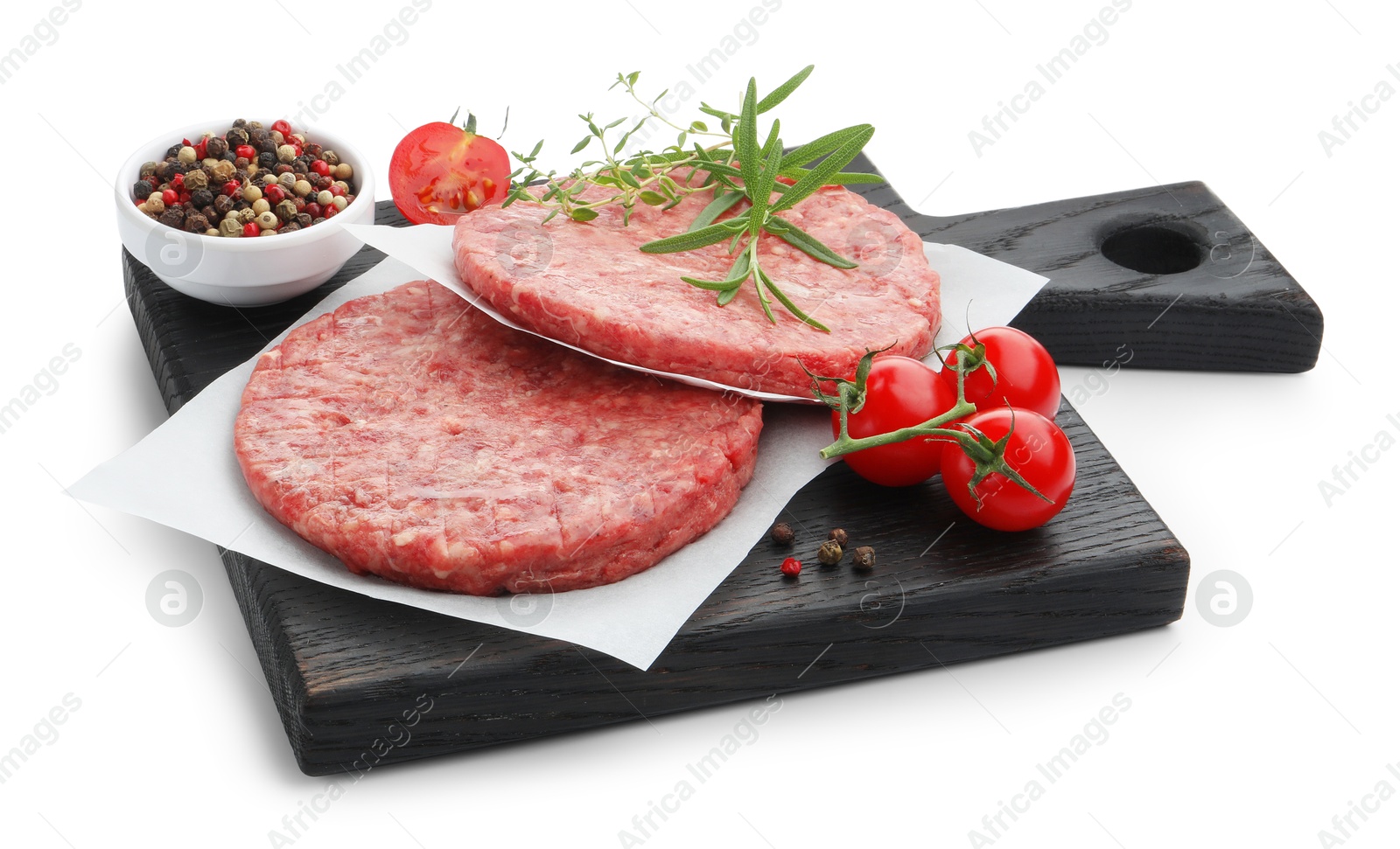 Fresh raw patties for burger, tomatoes and spices isolated on white Photo of Fresh raw patties for burger, tomatoes and spices isolated on white