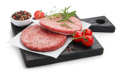 Photo of Fresh raw patties for burger, tomatoes and spices isolated on white