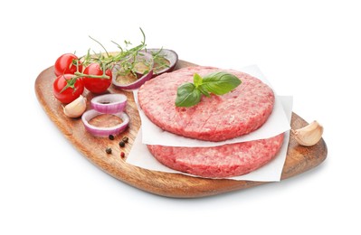 Photo of Fresh raw patties for burger, tomatoes and spices isolated on white