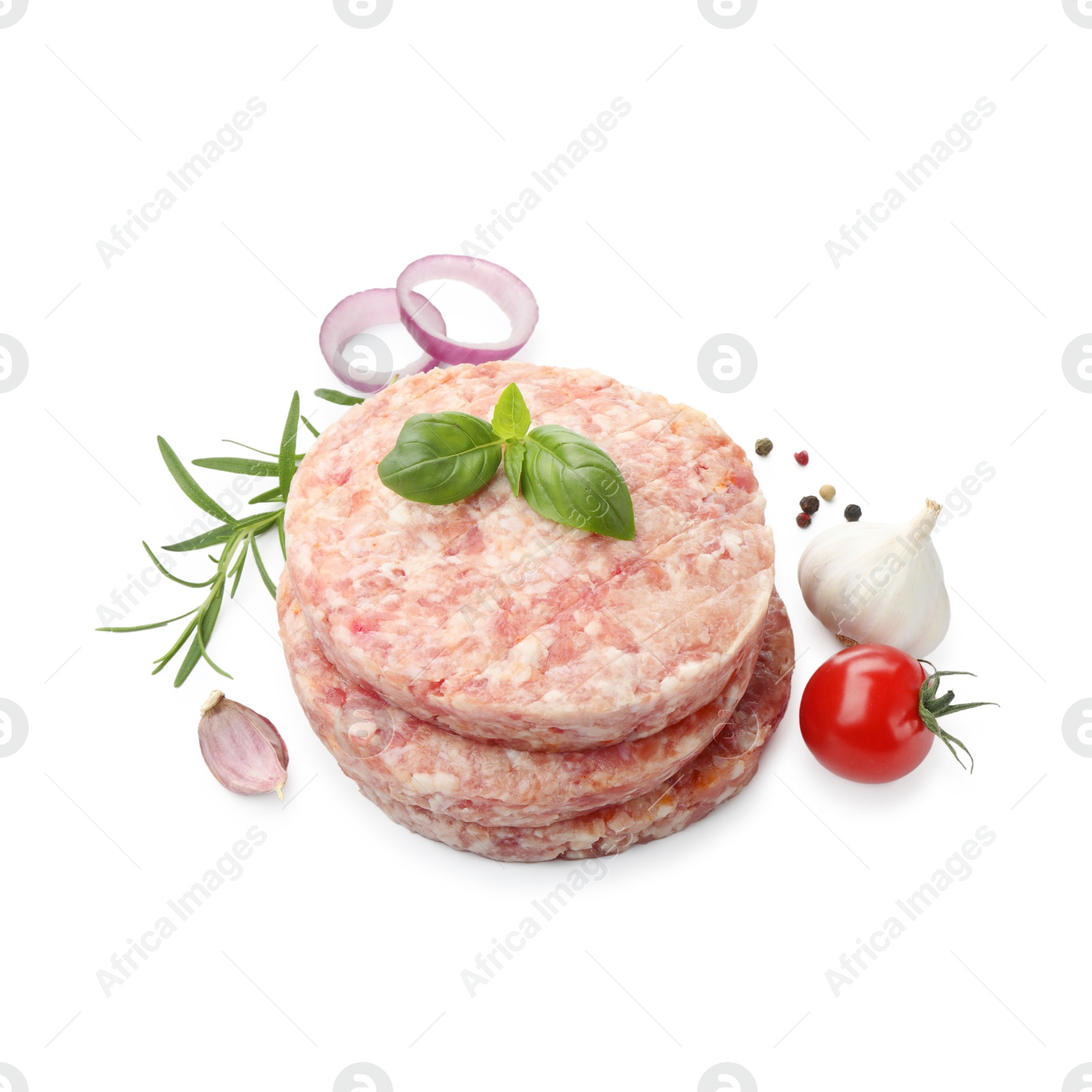 Fresh raw patties for burger, tomato and spices isolated on white, above view Photo of Fresh raw patties for burger, tomato and spices isolated on white, above view