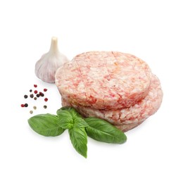 Photo of Fresh raw patties for burger and spices isolated on white