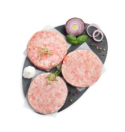 Photo of Fresh raw patties for burger and spices isolated on white, top view
