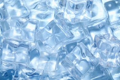 Photo of Cubes of clear ice as background, closeup