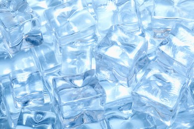 Photo of Cubes of clear ice as background, closeup