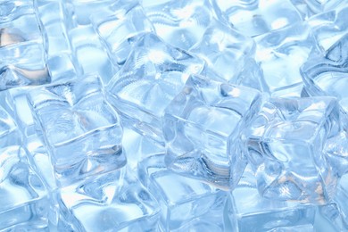 Photo of Cubes of clear ice as background, closeup