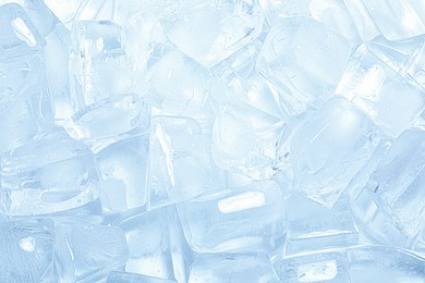 Photo of Cubes of clear ice as background, closeup