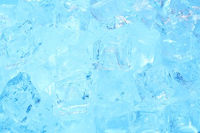 Photo of Cubes of clear ice as background, closeup