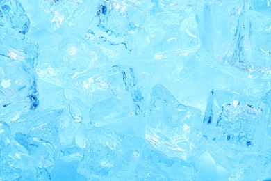 Photo of Cubes of clear ice as background, closeup