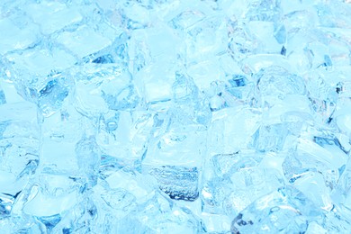 Photo of Cubes of clear ice as background, closeup